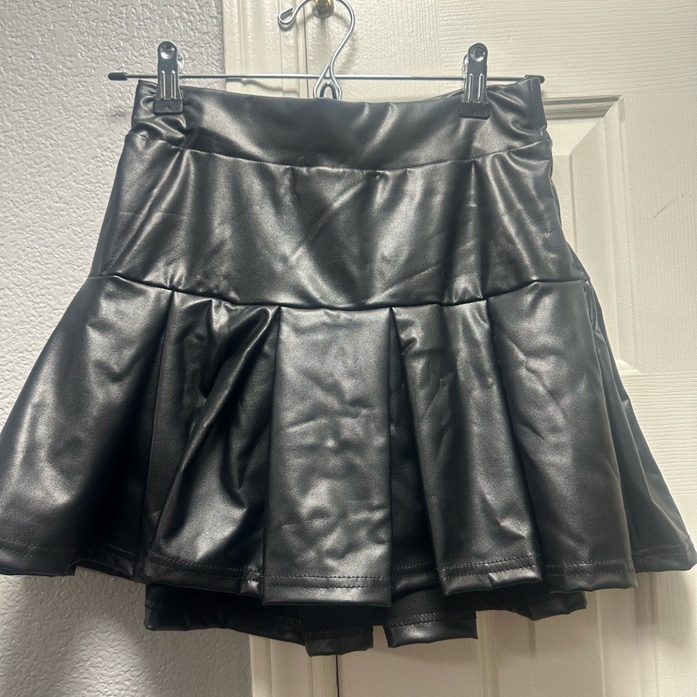 Size small JNK black skirt that has attached shorts